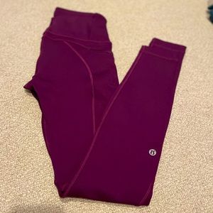 LULULEMON leggings- size 4- thicker material- 2 side zippers-fun seam details